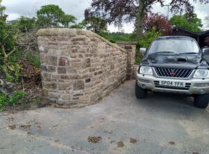driveway stone wall repair in Manchester