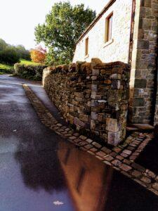 dry stone wall with pillar in the ribble valley