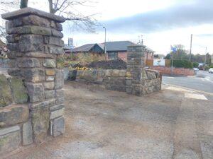 Stone wall builder inGreater Manchester